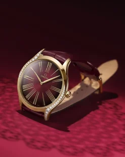 36 mm, Moonshine™ gold on leather strap