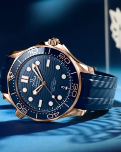 42 mm, Sedna™ gold on rubber strap