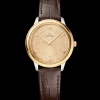 30 mm, steel ‑ yellow gold on leather strap