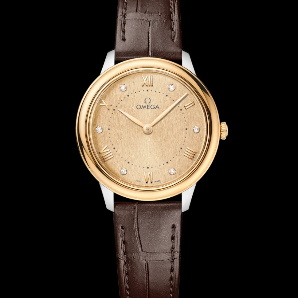 30 mm, steel ‑ yellow gold on leather strap