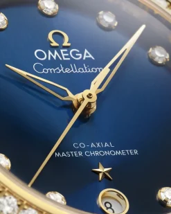 36 mm, steel ‑ yellow gold on leather strap