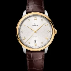 40 mm, steel ‑ yellow gold on leather strap