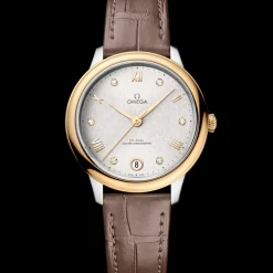 34 mm, steel ‑ yellow gold on leather strap