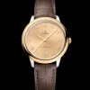 34 mm, steel ‑ yellow gold on leather strap