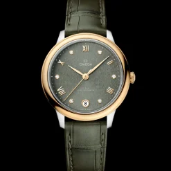 34 mm, steel ‑ yellow gold on leather strap