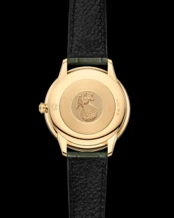 30 mm, yellow gold on leather strap