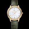 34 mm, yellow gold on leather strap